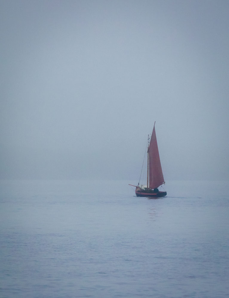 Boat with Red Sails